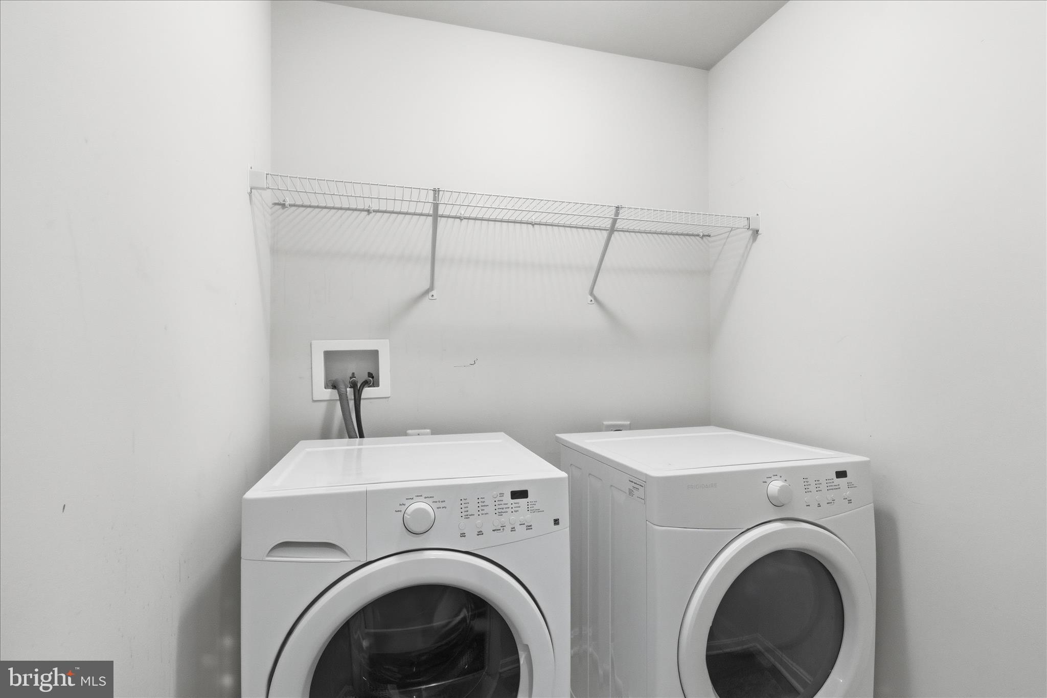 9511 Smithview Place Lanham, MD 20706 - Photo 32 of 33 a utility room with dryer and washer