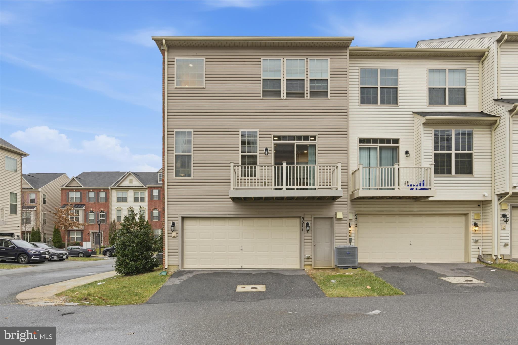 9511 Smithview Place Lanham, MD 20706 - Photo 33 of 33 a front view of a house with a yard and garage