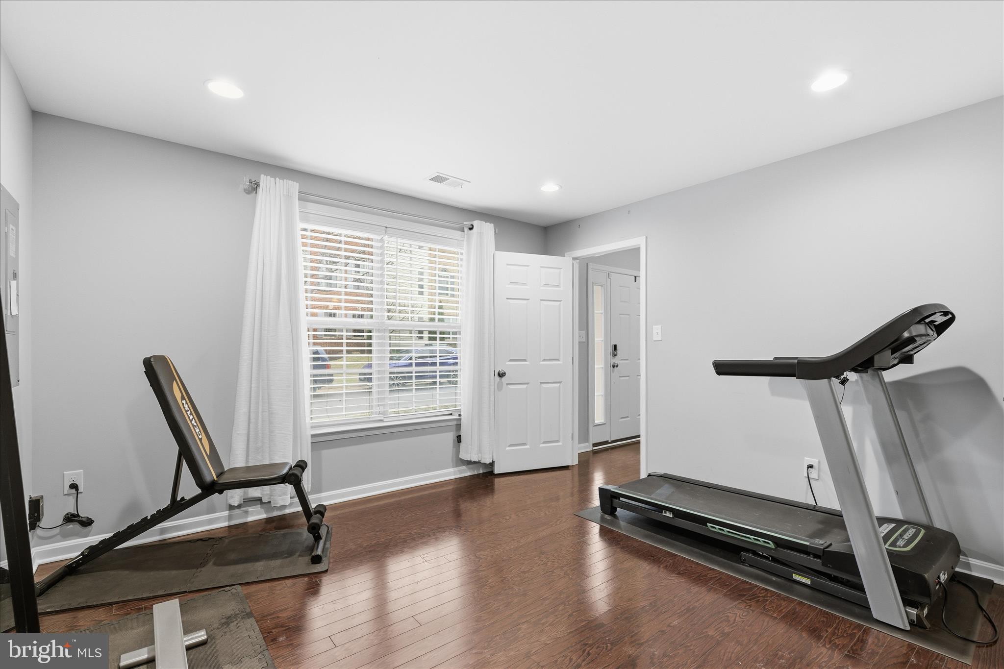 9511 Smithview Place Lanham, MD 20706 - Photo 5 of 33 a view of a room with gym equipment