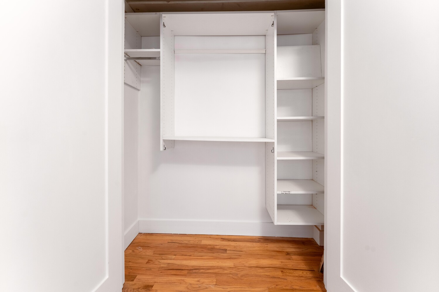 121 Division Street, Unit 2A Manhattan, NY 10002 - Photo 11 of 23 a view of walk in closet with empty racks