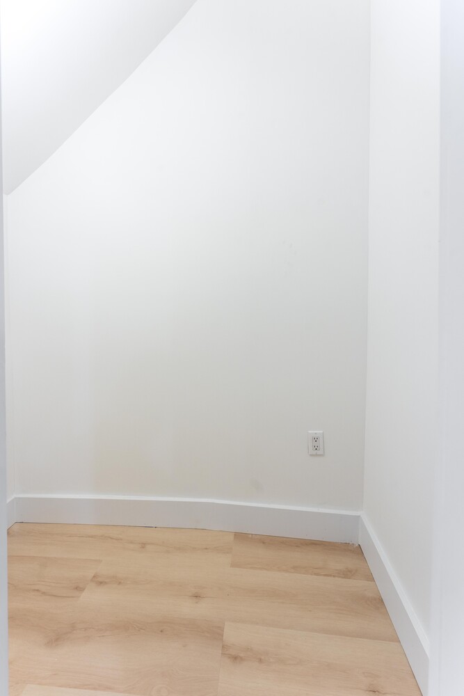121 Division Street, Unit 2A Manhattan, NY 10002 - Photo 20 of 23 a view of an empty room