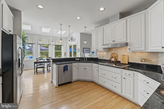 a large kitchen with cabinets