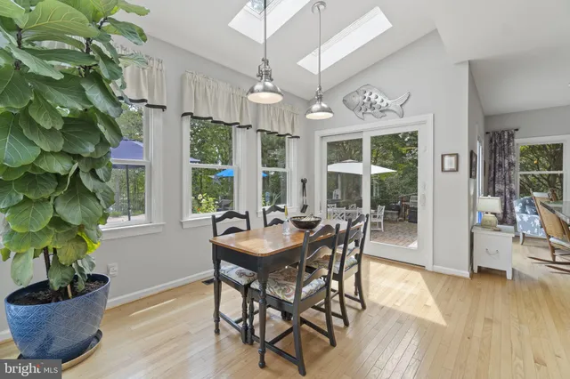 a living room with furniture fireplace and flat screen tv