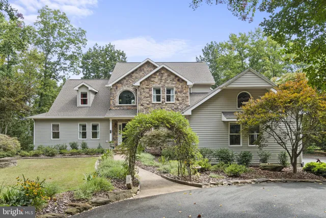 front view of a house with a garden