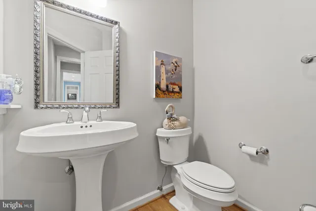 a view of a room with gym equipment and windows