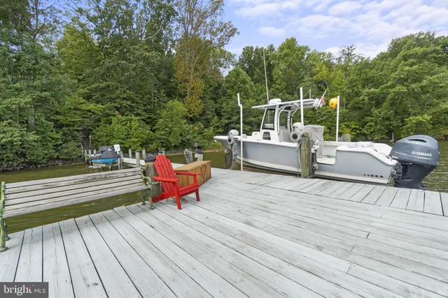 view of house with yard and outdoor seating