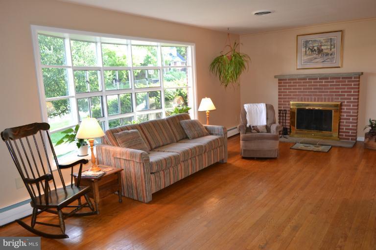 120 Highland Road Westminster, MD 21157 - Photo 22 of 30 L.R w/ HW floors, wood FP & Bay Window