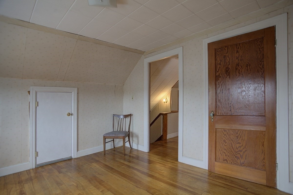44 Cottage Park Road Winthrop, MA 02152 - Photo 22 of 39 a view of empty room with wooden floor