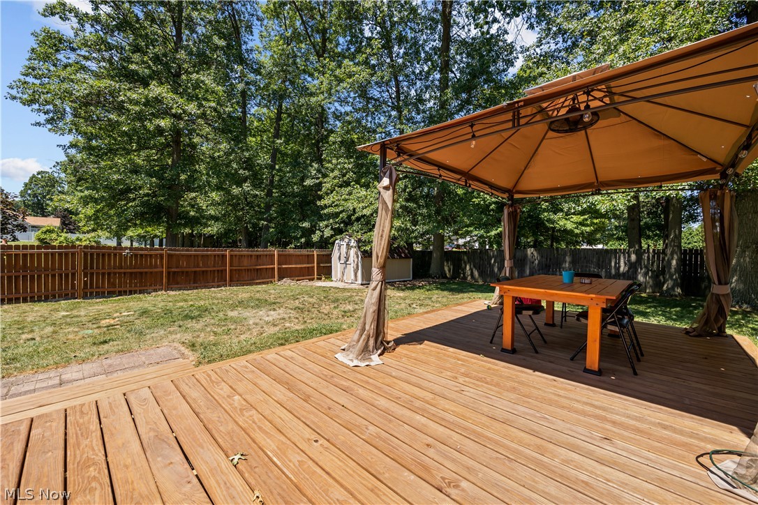 684 Guilford Road Vermilion, OH 44089 - Photo 37 of 37 Deck with a yard and a gazebo