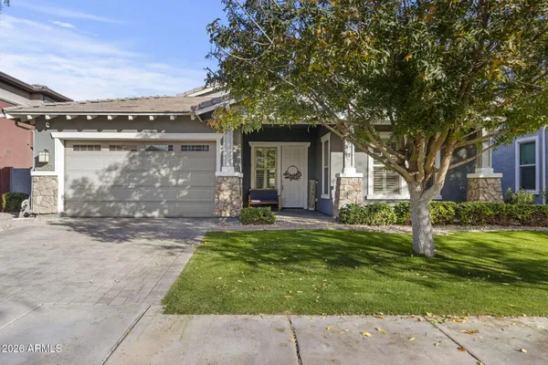 front view of a house with a yard