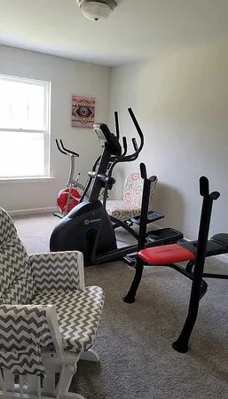 a bedroom with furniture and window