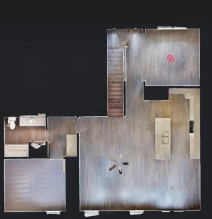 a view of living room with furniture and a lamp