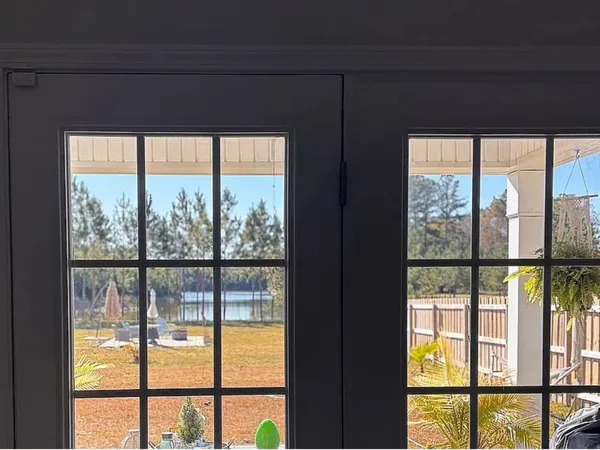 a view of an empty room with a window