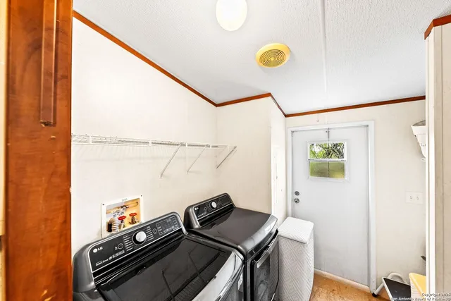 a view of a stove top oven and a table