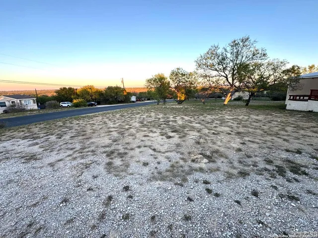 a view of road with trees
