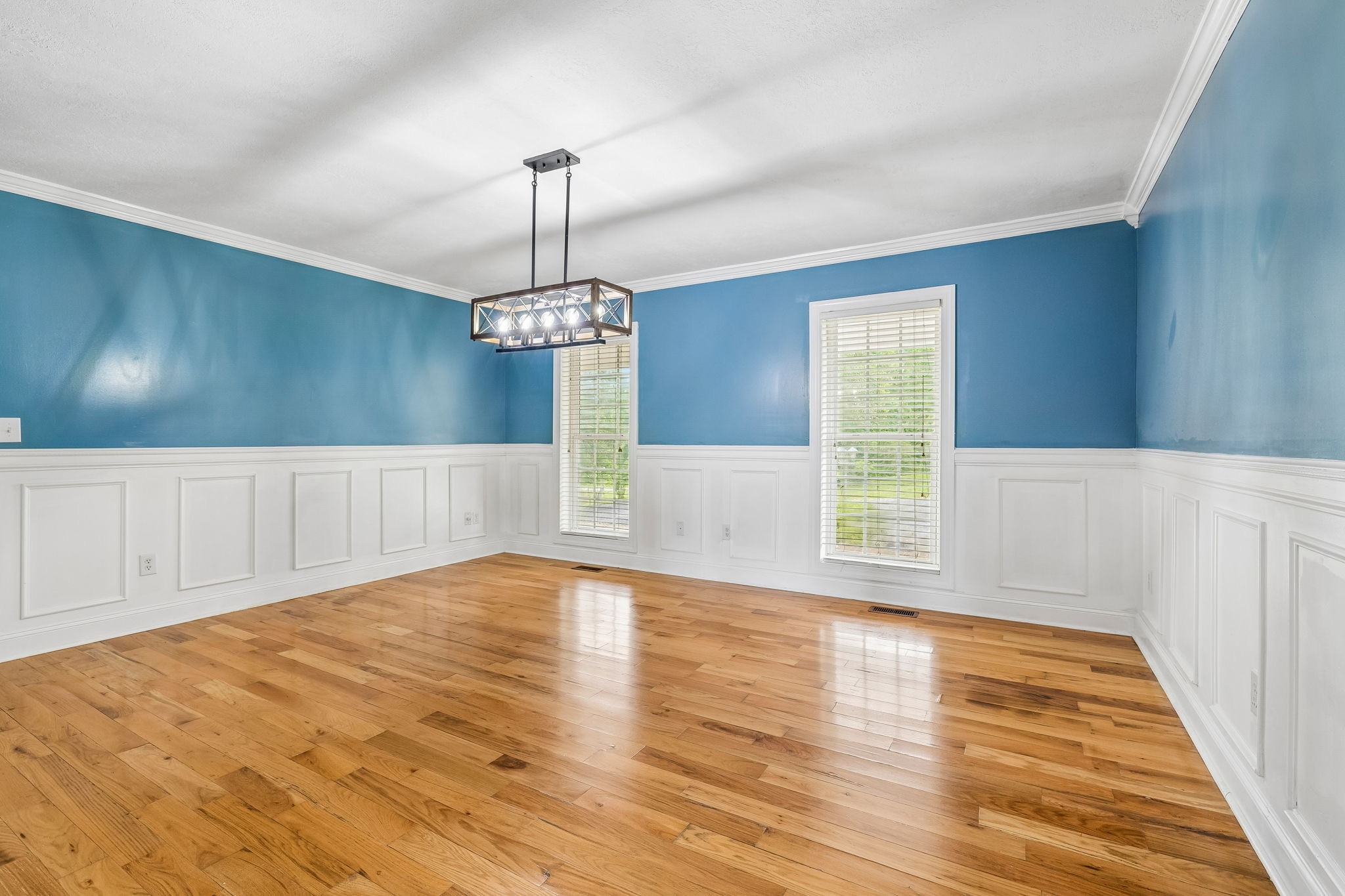 6701 McCormick Ridge Road Whitleyville, TN 38588 - Photo 13 of 63 a view of empty room with wooden floor and fan
