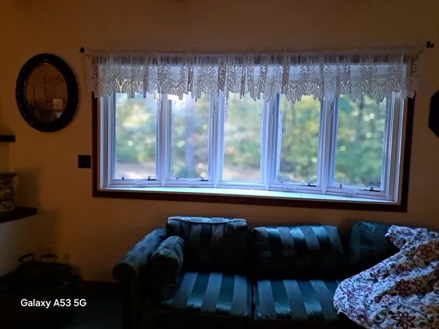 a kitchen with granite countertop a stove and a sink