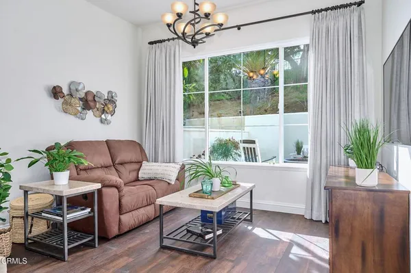 a view of a dining room with furniture window and outside view