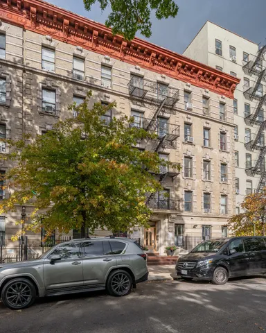 a view of a cars parked in front of a building