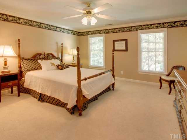 313 Carpathian Way Raleigh, NC 27615 - Photo 14 of 25 Spacious secondary bedroom with private full bath access. Bedroom