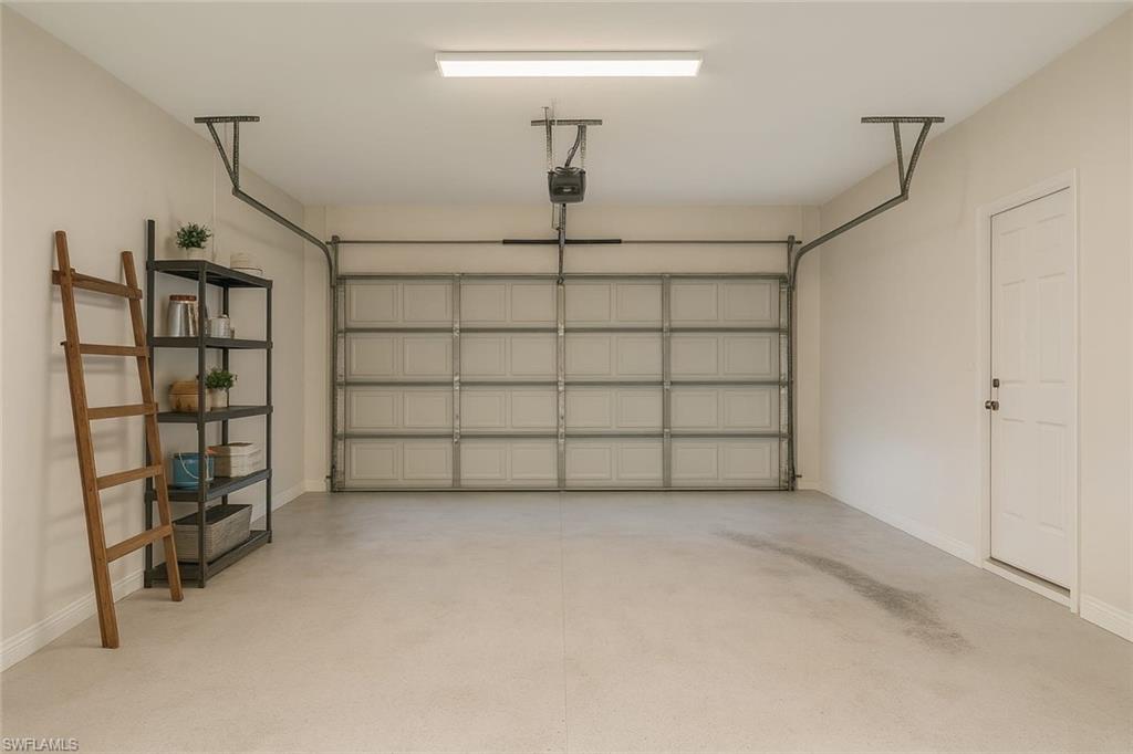 241 8th Street Southeast Naples, FL 34117 - Photo 41 of 50 a view of a room with racks on the wall