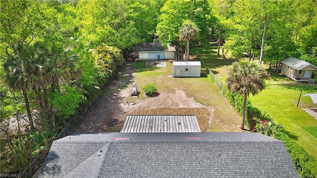 241 8th Street Southeast Naples, FL 34117 - Photo 47 of 50 a view of a yard with plants