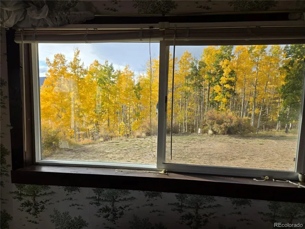 a view of a room with a window