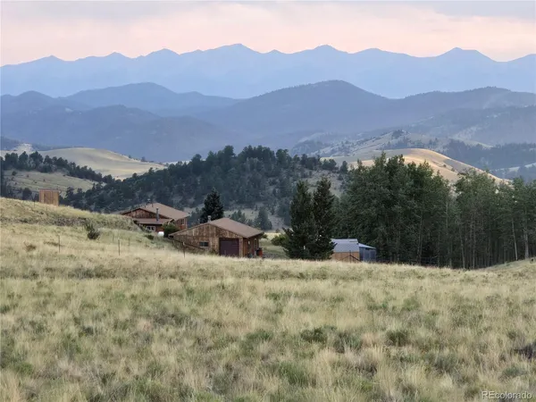 a view of a mountain with an outdoor space