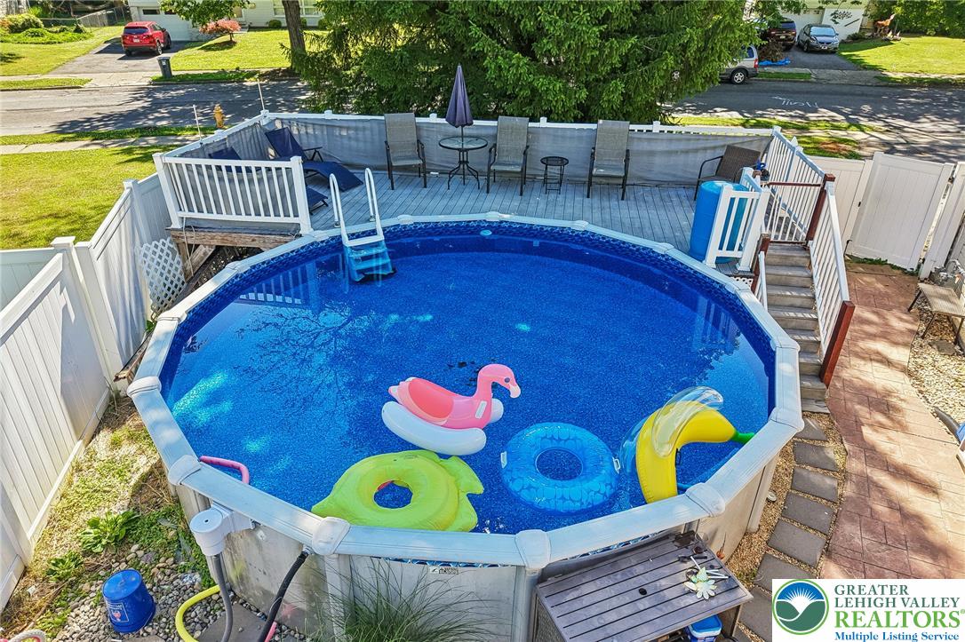 2649 Nottingham Road Bethlehem, PA 18017 - Photo 39 of 49 An inviting above-ground pool with a spacious surrounding deck creates an ideal outdoor retreat.