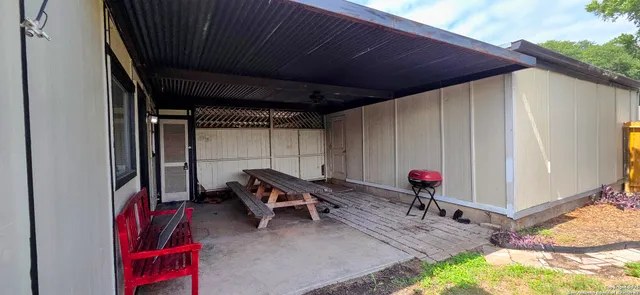 a house with trees in the background