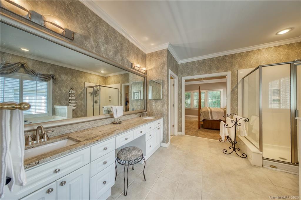 3518 Rhett Butler Place Charlotte, NC 28270 - Photo 22 of 35 a bathroom with a granite countertop sink mirror and double