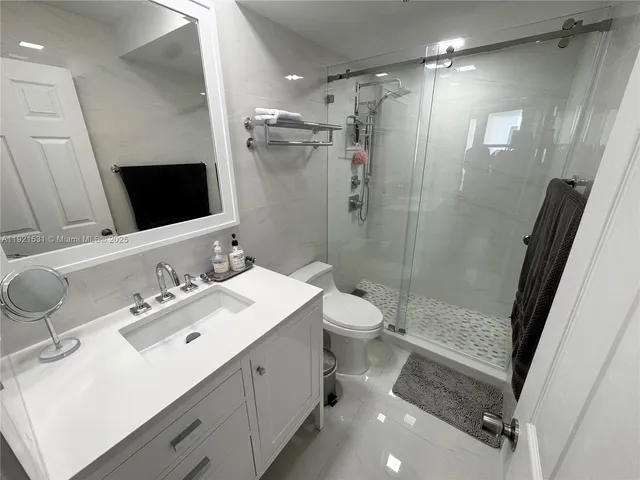 a living room with furniture rug and window