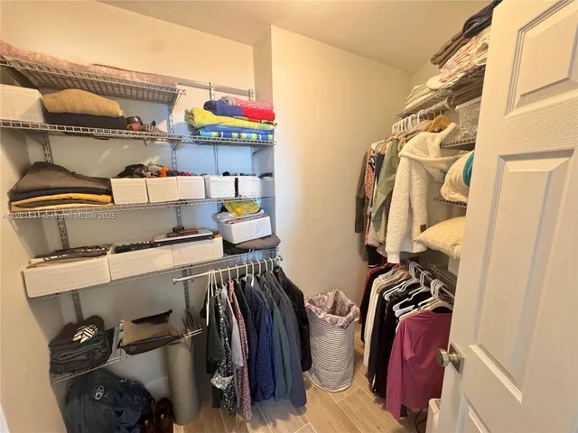 a view of a street with a building in the background