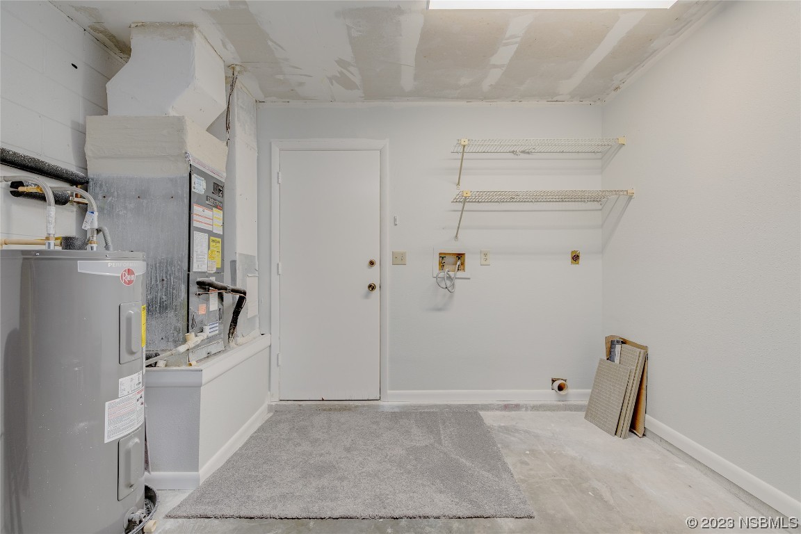 404 Sea Gull Court Edgewater, FL 32141 - Photo 21 of 28 a view of walk in closet with empty racks