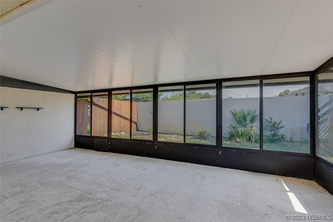 404 Sea Gull Court Edgewater, FL 32141 - Photo 22 of 28 a view of an empty room with a window