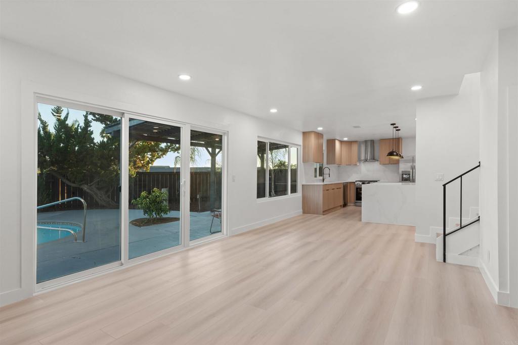 1708 Harold Road Escondido, CA 92026 - Photo 12 of 40 a view of a kitchen with furniture and an empty room