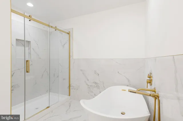 a bathroom with a sink and a shower