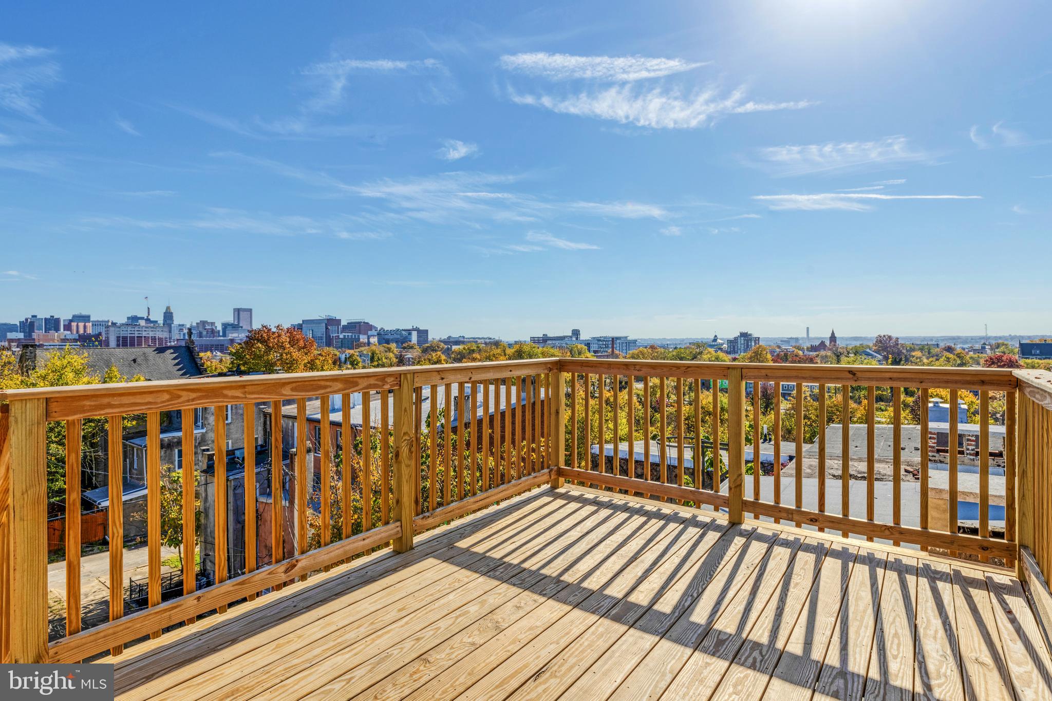 1102 Harlem Avenue Baltimore, MD 21217 - Photo 31 of 36 a view of wooden balcony with city view