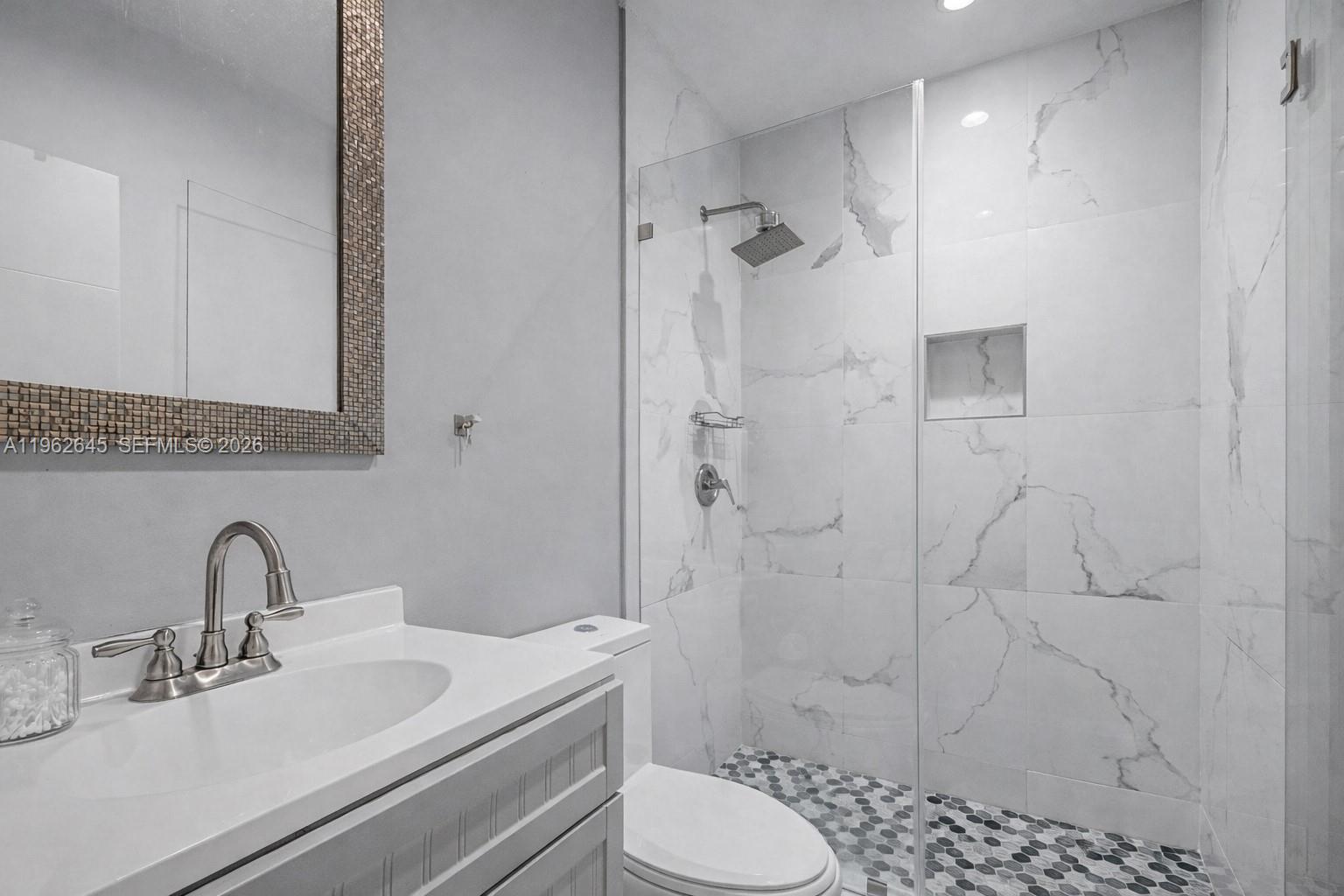 2900 Southwest 4th Street Miami, FL 33135 - Photo 12 of 18 a bathroom with a sink toilet and shower