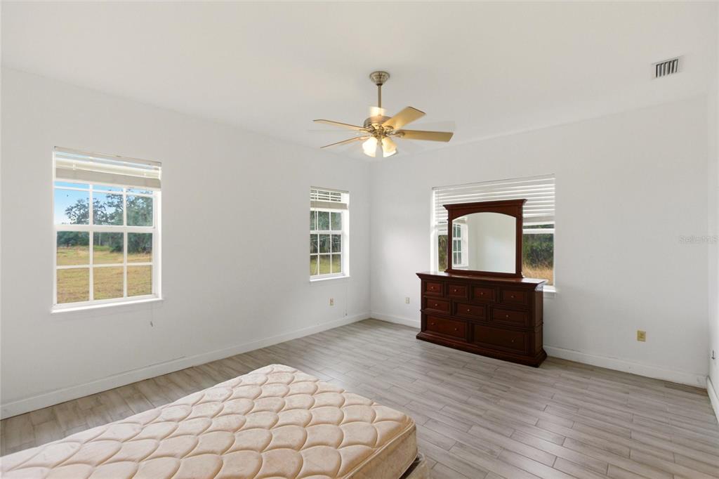 1841 State Rte 66 Zolfo Springs, FL 33890 - Photo 13 of 34 a bedroom with a bed and a window