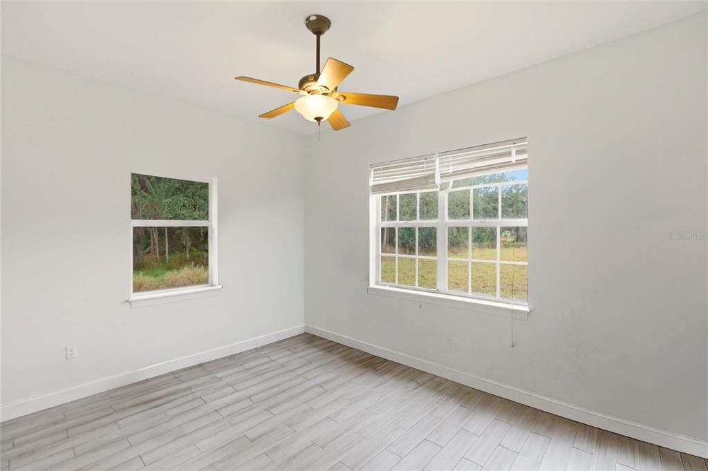 1841 State Rte 66 Zolfo Springs, FL 33890 - Photo 18 of 34 an empty room with a window