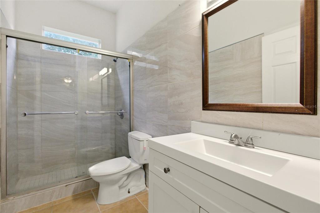 1841 State Rte 66 Zolfo Springs, FL 33890 - Photo 21 of 34 a bathroom with a sink toilet and shower