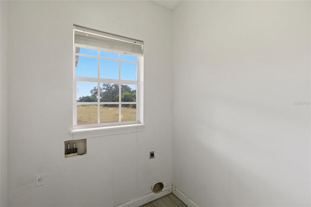 1841 State Rte 66 Zolfo Springs, FL 33890 - Photo 25 of 34 a bathroom with a window