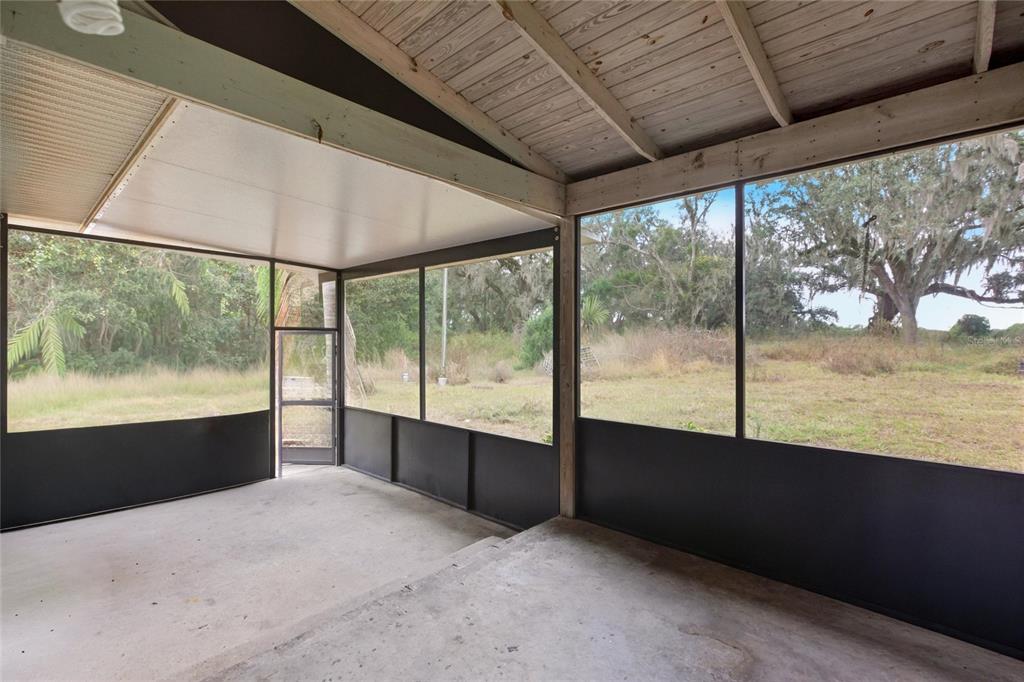 1841 State Rte 66 Zolfo Springs, FL 33890 - Photo 26 of 34 a view of an empty room with a large window