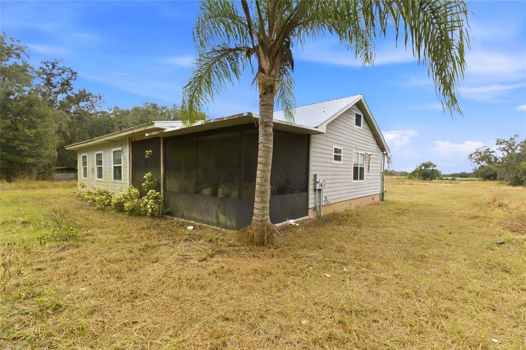 1841 State Rte 66 Zolfo Springs, FL 33890 - Photo 29 of 34 a view of a house with a patio