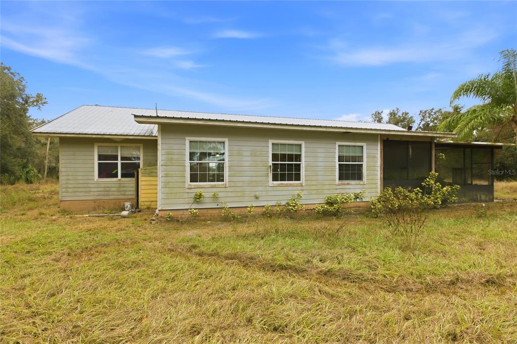 1841 State Rte 66 Zolfo Springs, FL 33890 - Photo 31 of 34 a backyard of a house