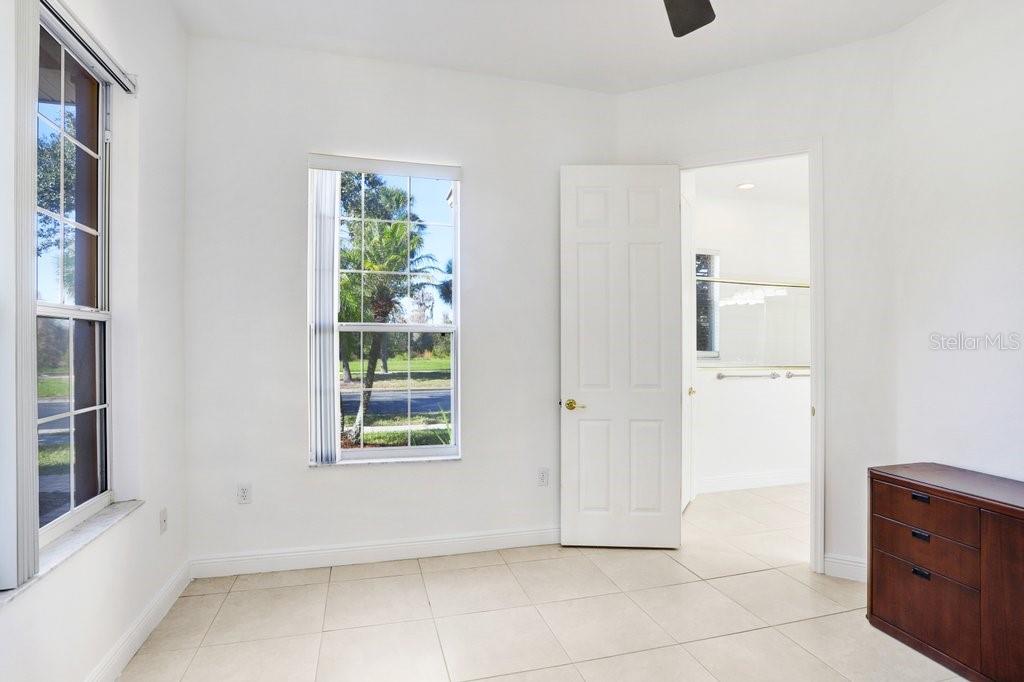 699 Glendora Road Kissimmee, FL 34759 - Photo 14 of 56 a view of an empty room with a window