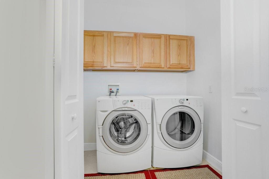699 Glendora Road Kissimmee, FL 34759 - Photo 30 of 56 a utility room with dryer and washer