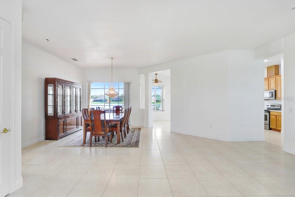 699 Glendora Road Kissimmee, FL 34759 - Photo 31 of 56 a view of a livingroom with furniture and window