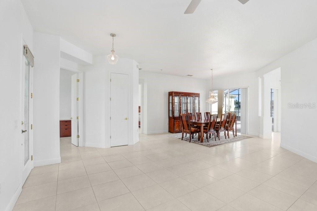 699 Glendora Road Kissimmee, FL 34759 - Photo 32 of 56 a view of dining room with furniture and chandelier